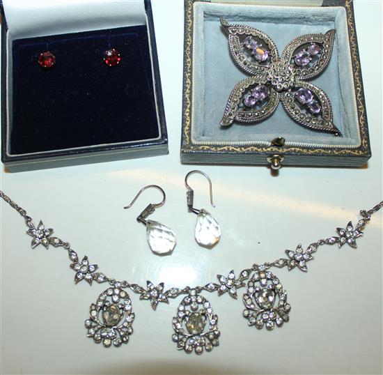 Paste necklace and earrings, paste set brooch and pair of garnet earrings and a faux amber necklace & ear clips